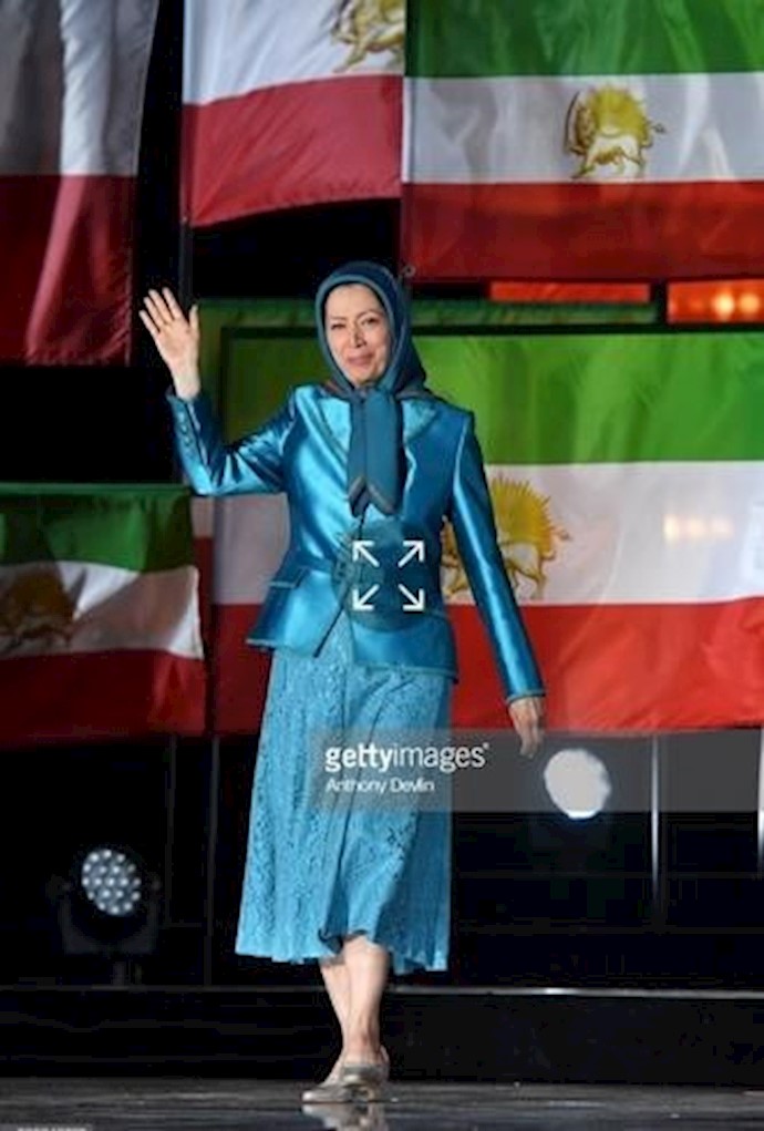 Maryam Rajavi shakes hands for her fans
