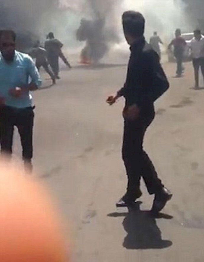 Plumes of smoke fill city streets as brave Iranians take on the regime’s units