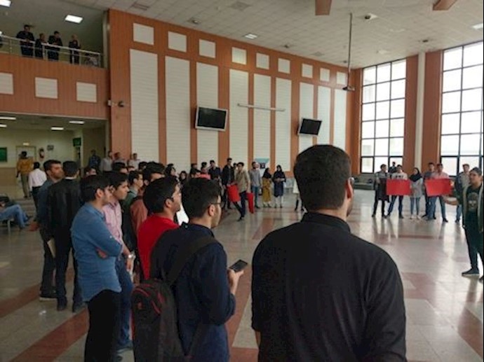 Khajeh-Nasir University students form a circle in the university auditorium, voicing their protest – Tehran, Iran – April 29, 2019