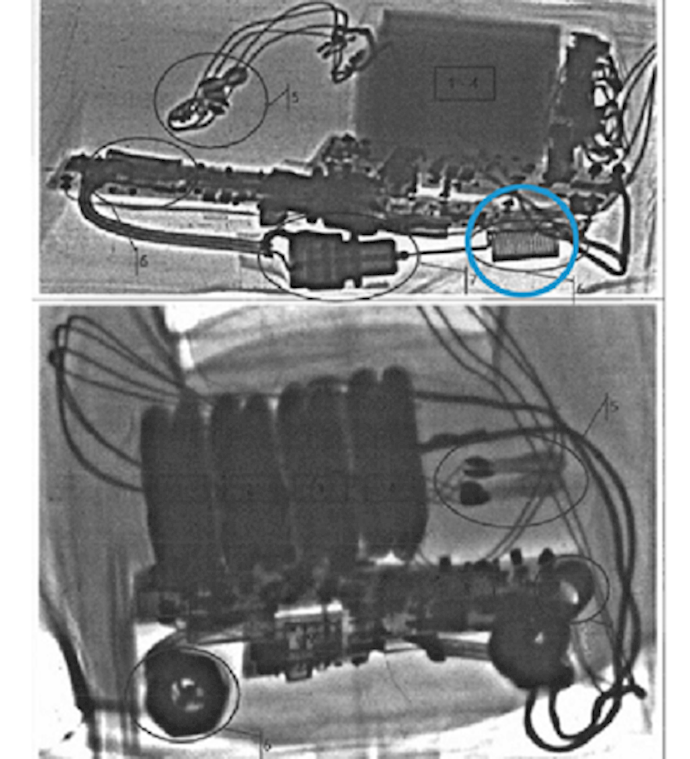 An X-ray of the bomb with the wireless detonator marked in blue.
