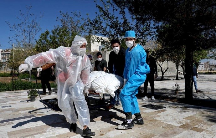 Body of a COVID-19 victim at a cemetery outside Tehran on March 30
