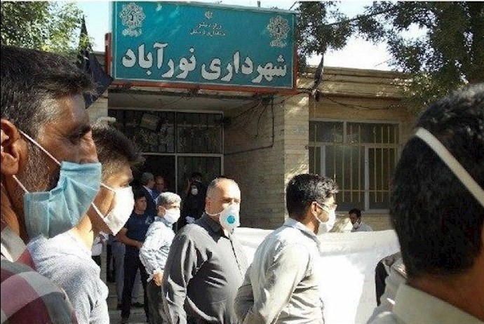 Locals of Nourabad in Lorestan province, western Iran, rallied outside the mayor’s office demanding standard streets for their town—August 1, 2020