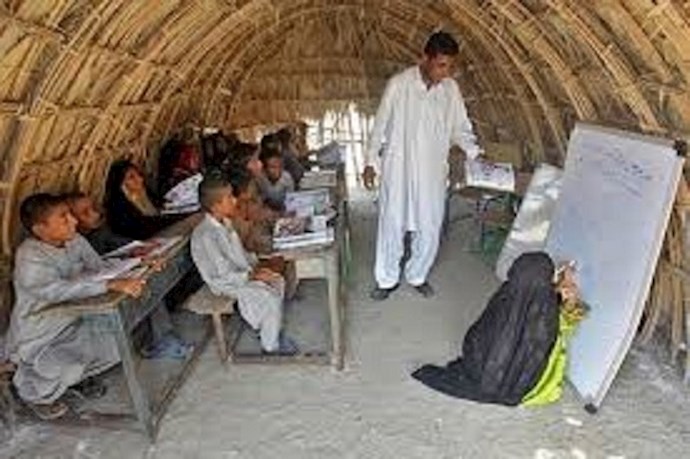 Children study in capers and tents in Sistan & Baluchistan province, southeast Iran