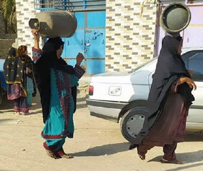 Gas cylinders carried by women in Sistan & Baluchistan province, southeast Iran
