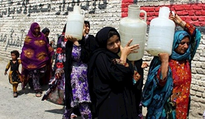 Women have to carry water for their houses in Sistan & Baluchistan province, southeast Iran