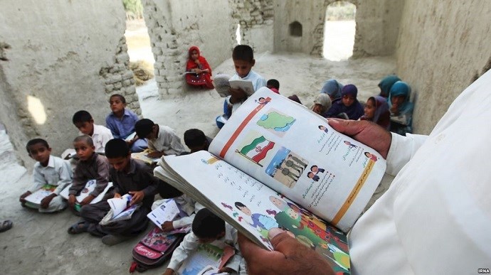 Children study in capers and tents in Sistan & Baluchistan province, southeast Iran