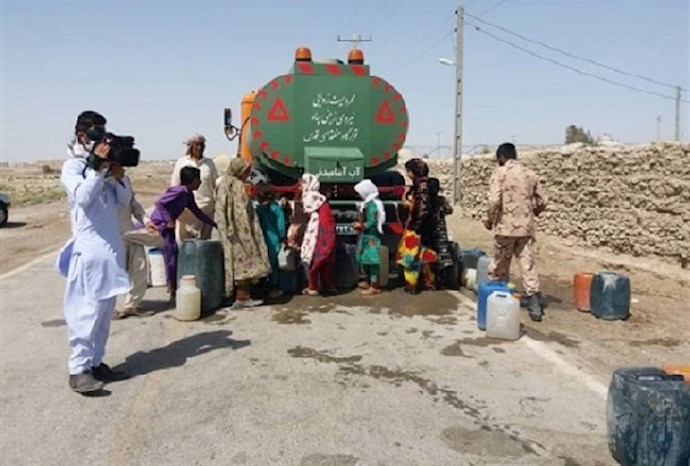 People fetch water for their homes in Sistan & Baluchistan province, southeast Iran