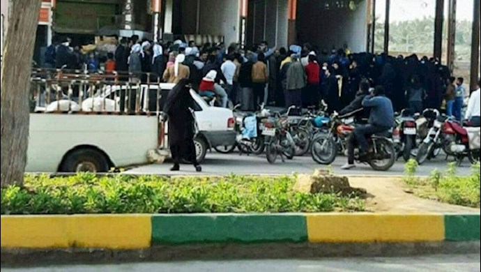 Shadegan, Khuzestan province, southeast of Iran, people are standing in line to buy cooking oil