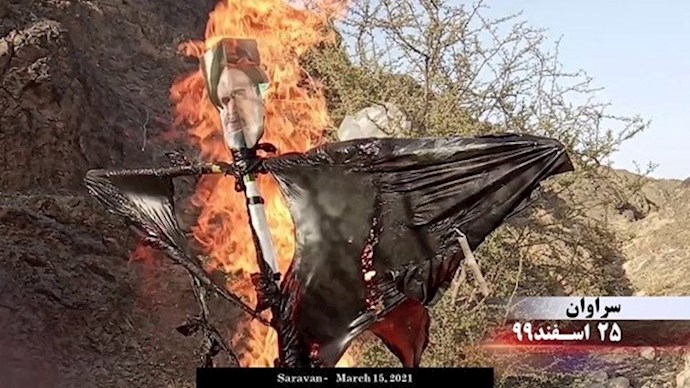 Burning effigies and placards of Khamenei on Iranian fire festival